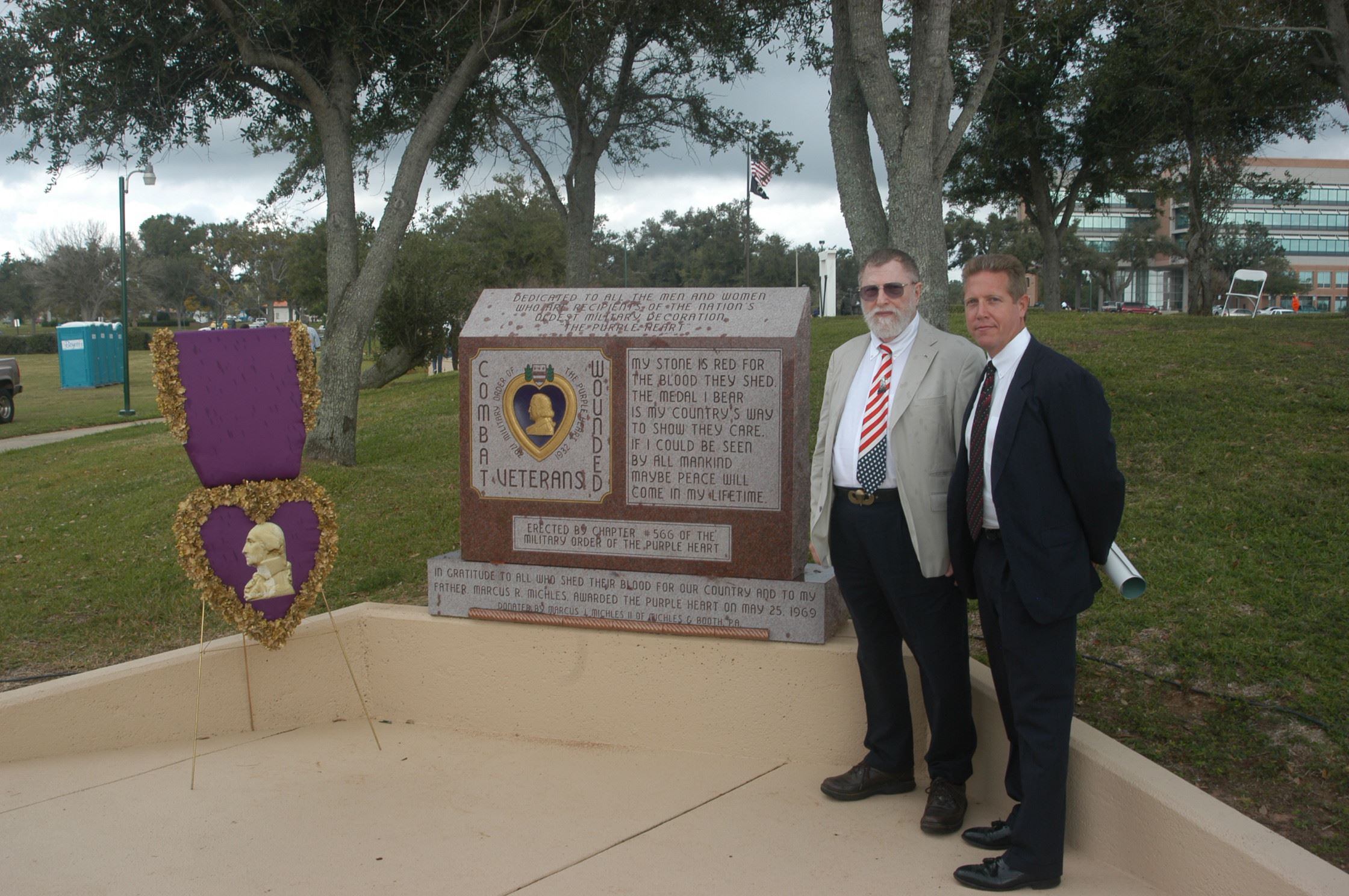 Senior Marcus Michles and  Marcus Michles II at Purple Heart memorial